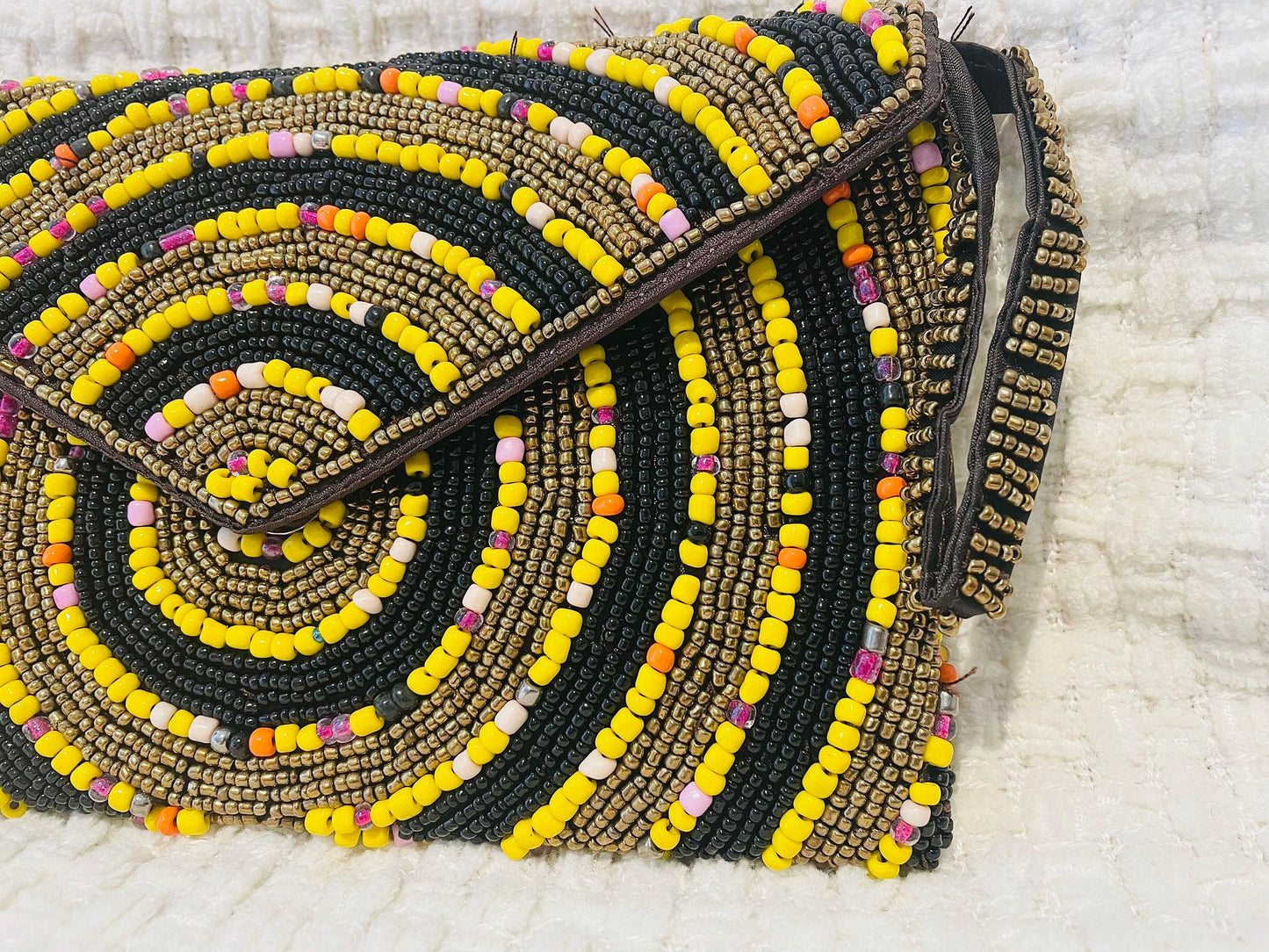 Hand beaded black and gold clutch