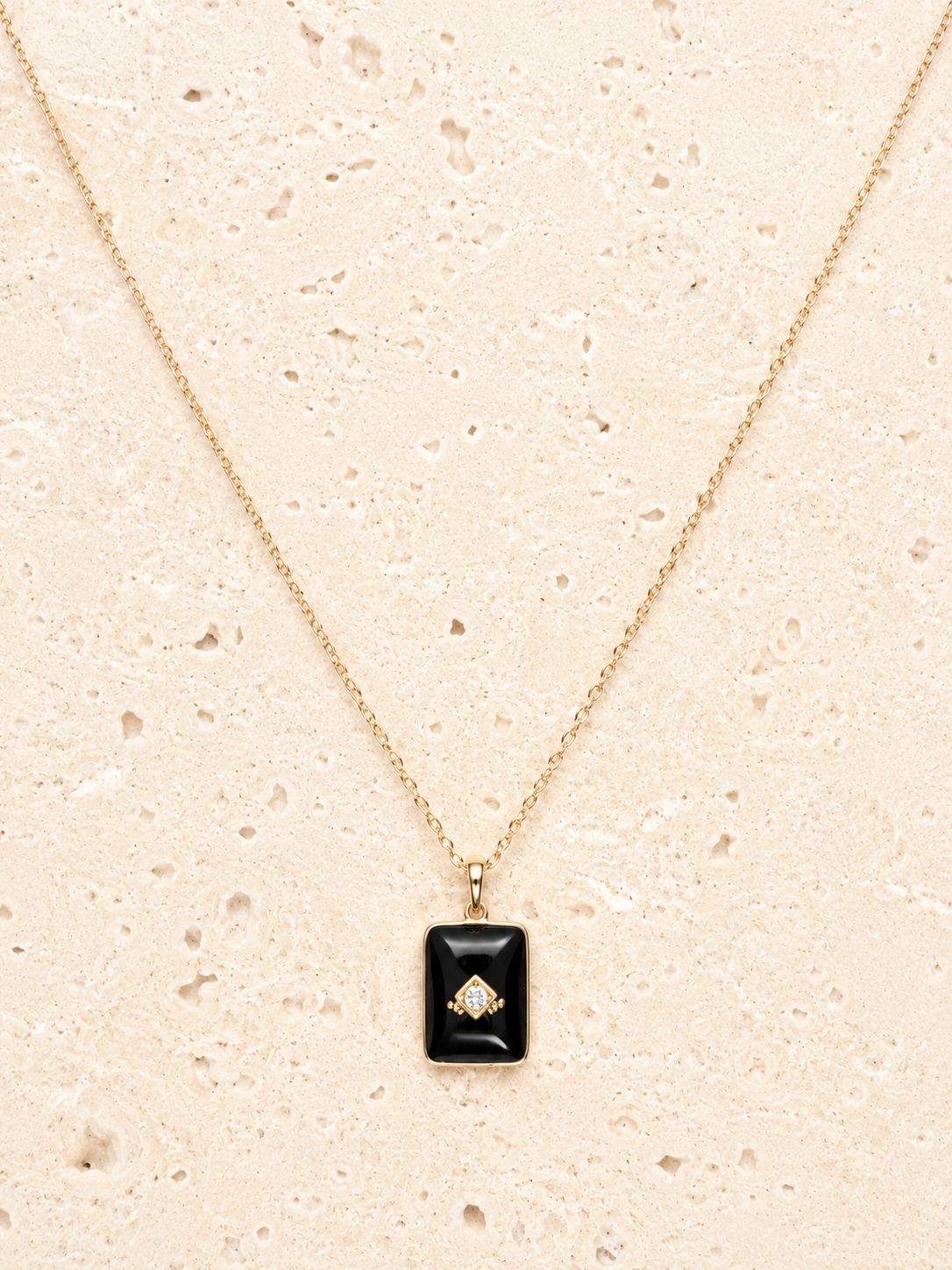 Onyx and crystal pendant necklace