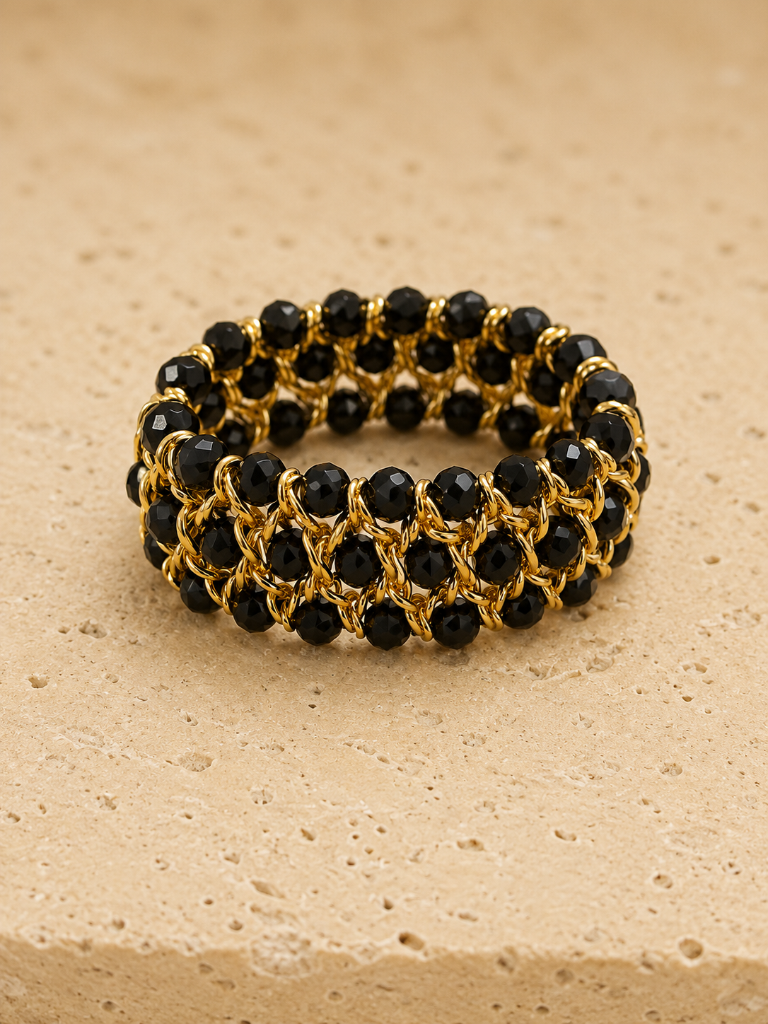 Black beaded and gold link bracelet