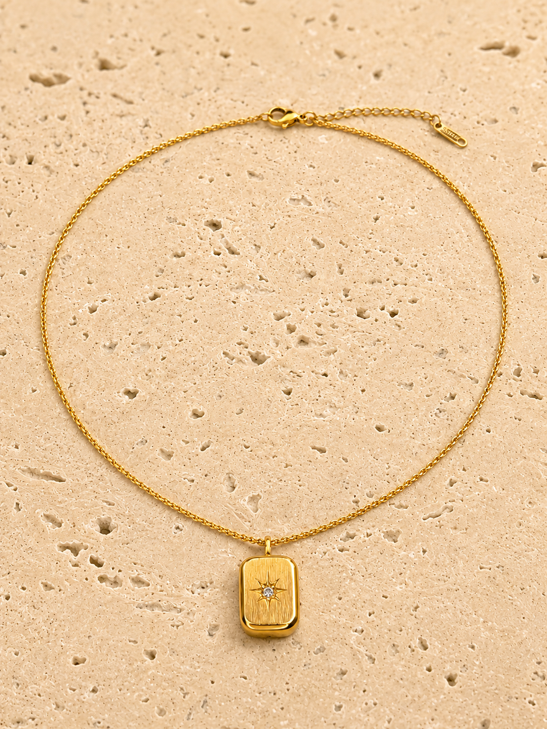 Golden crystal star pendant