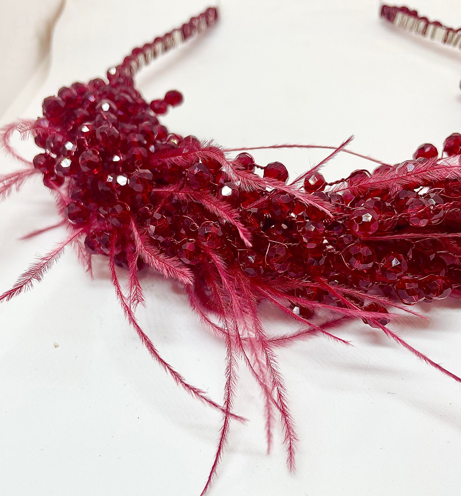 Artisan hair accessory: Headband detailed with feathers and beads - ruby red