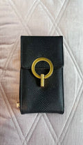Crossbody bag with bronzed metal clasp
