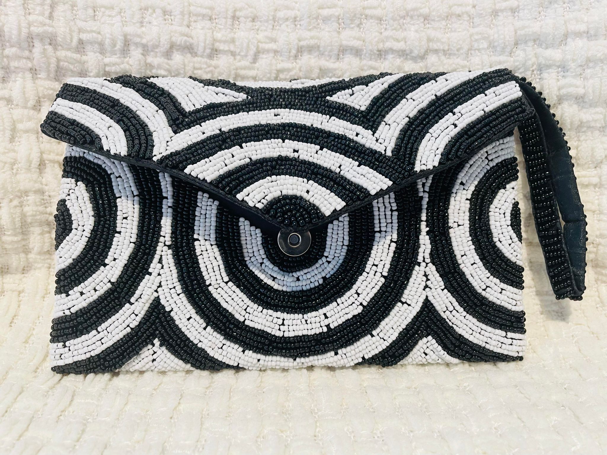 Hand beaded black and white clutch