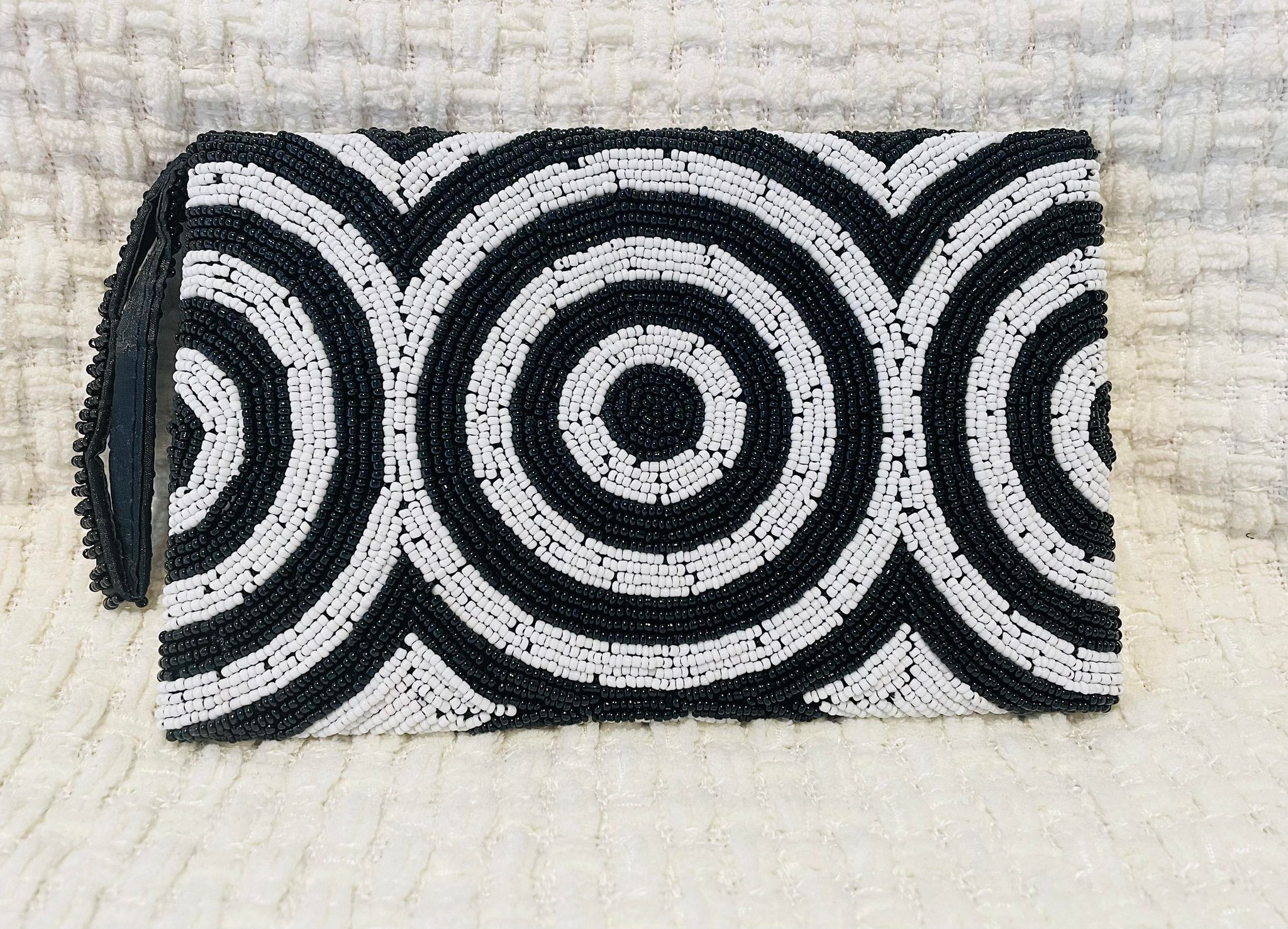 Hand beaded black and white clutch