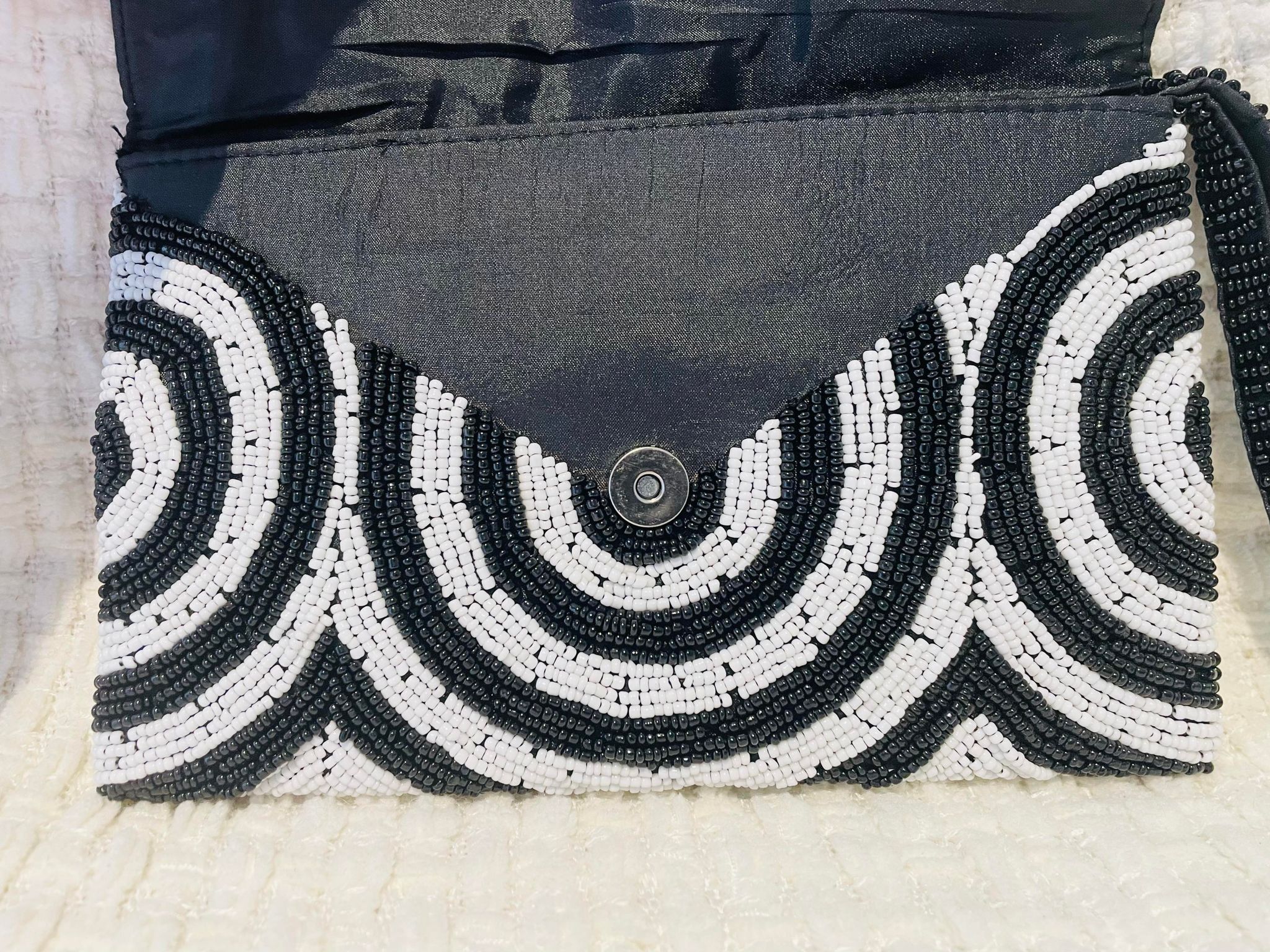 Hand beaded black and white clutch