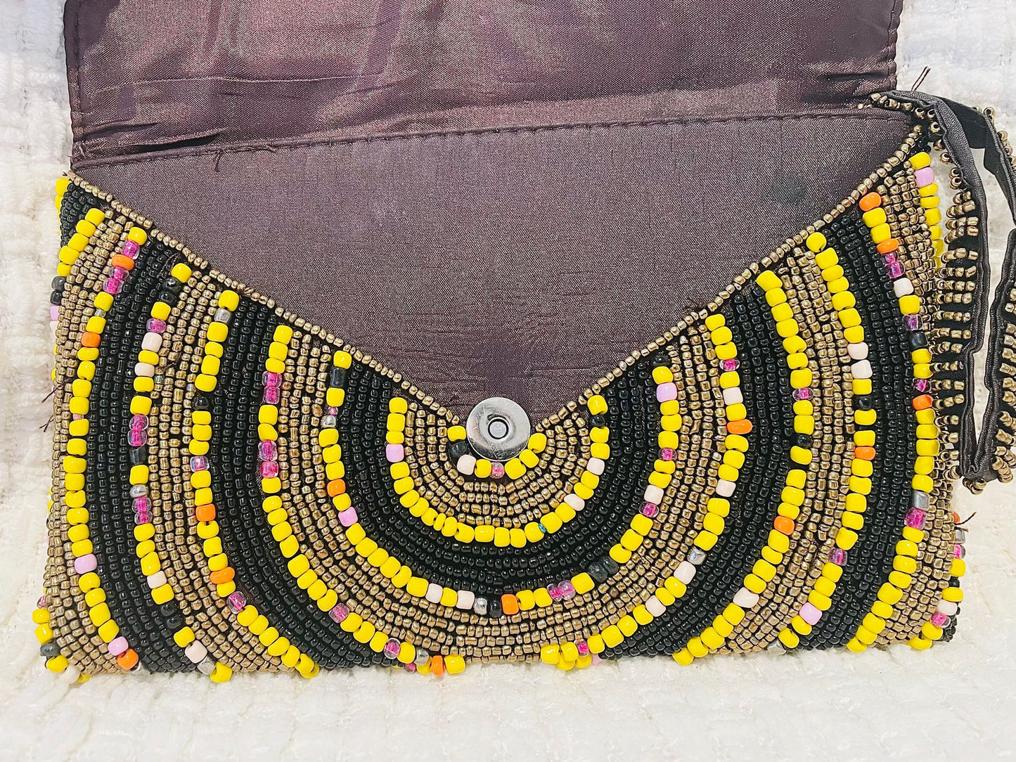 Hand beaded black and gold clutch