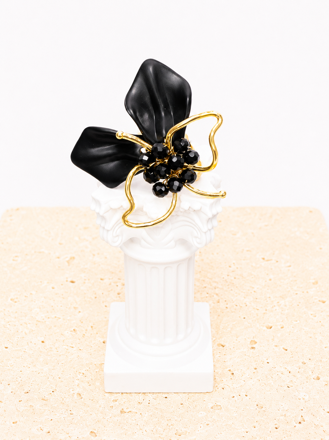Gold and black ring