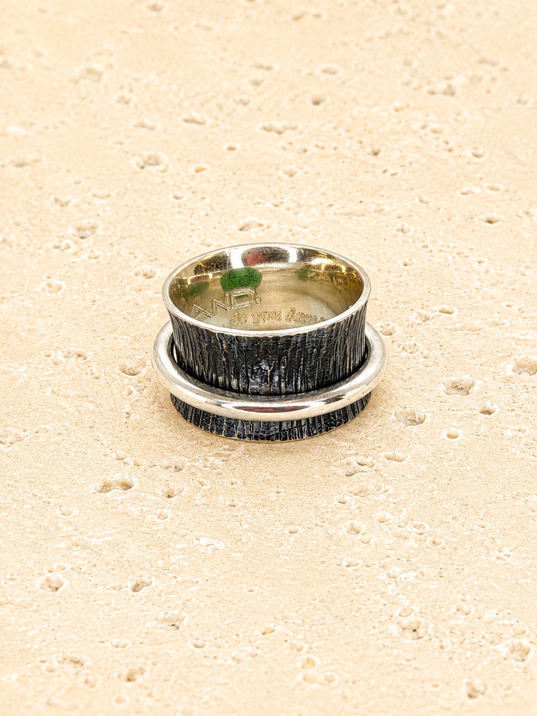 Silver spinner band