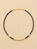 Beaded and gold necklace