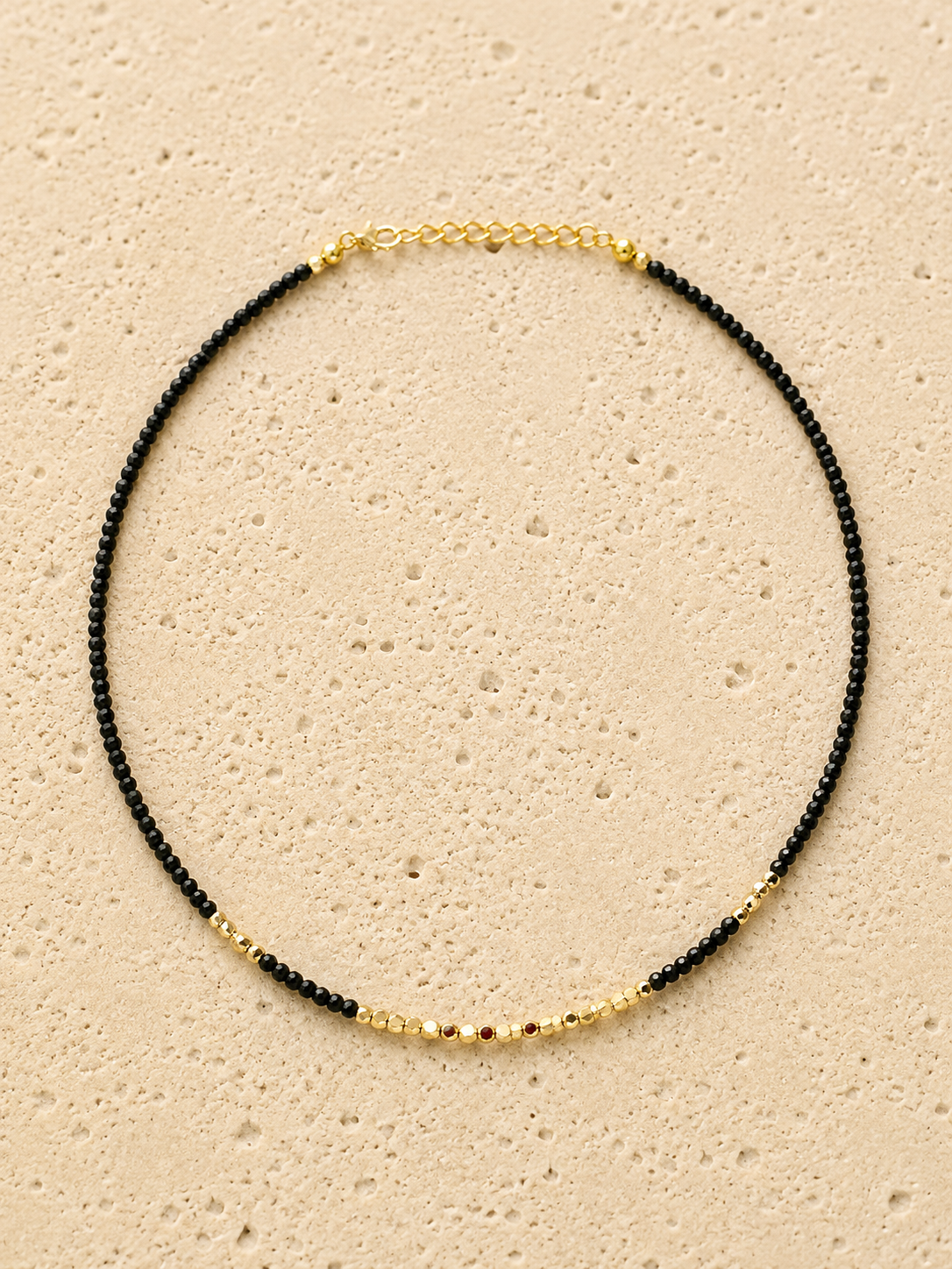 Beaded and gold necklace