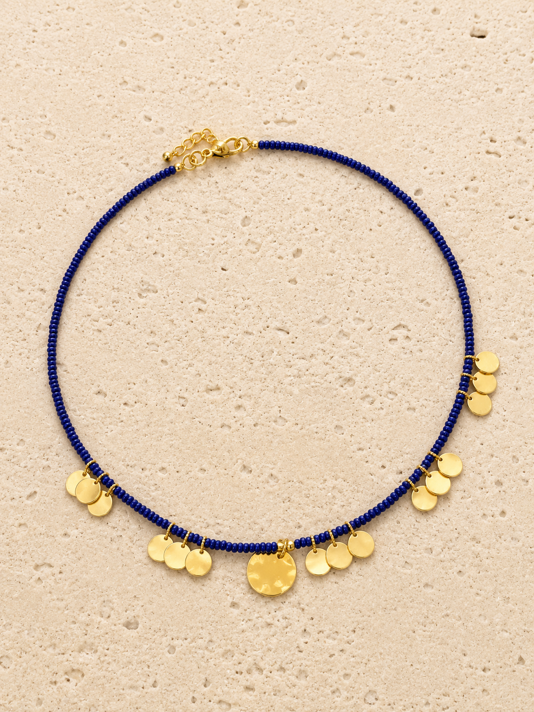 Gold beaten disc necklace