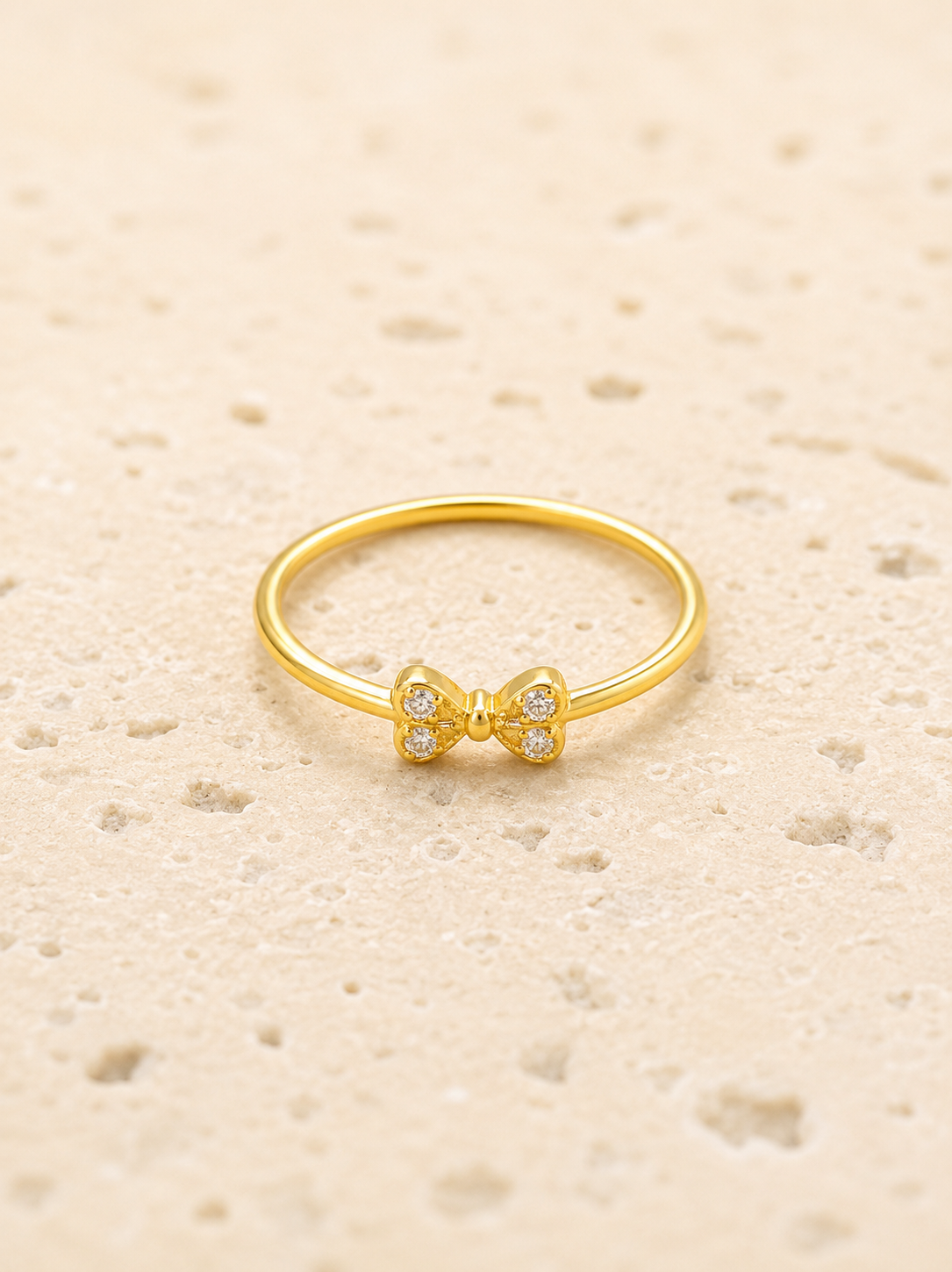 Gold crystal bow ring
