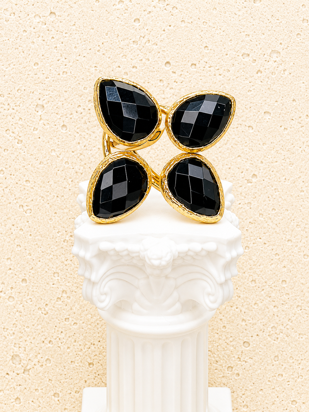 Brass and Onyx four leaf clover