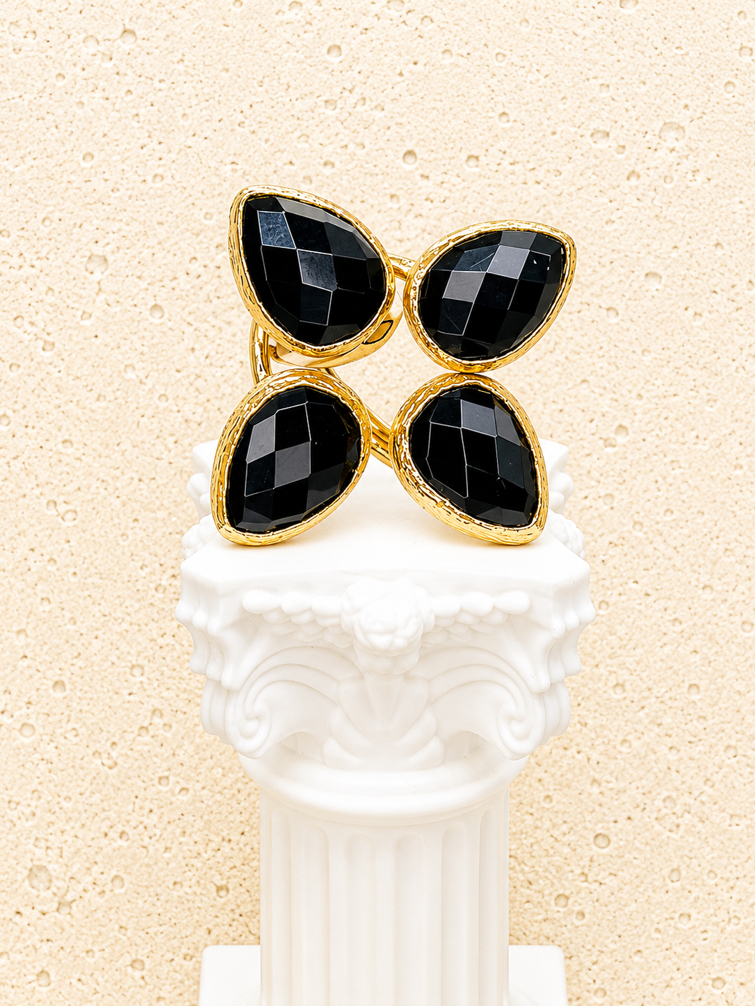 Brass and Onyx four leaf clover