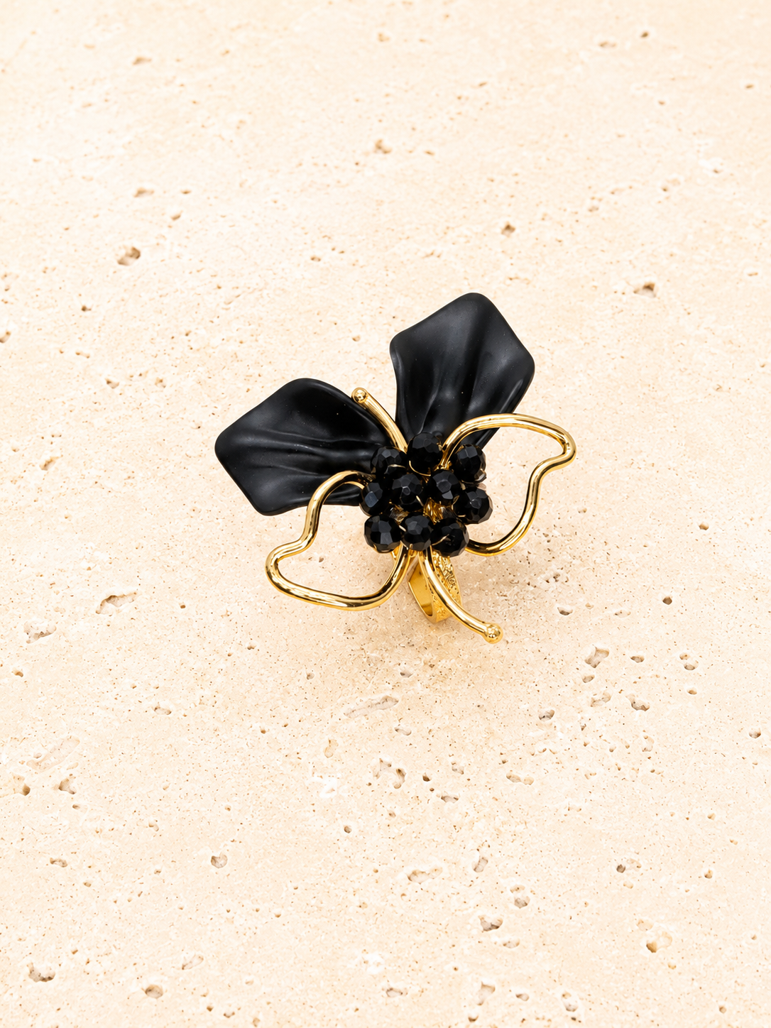 Gold and black ring
