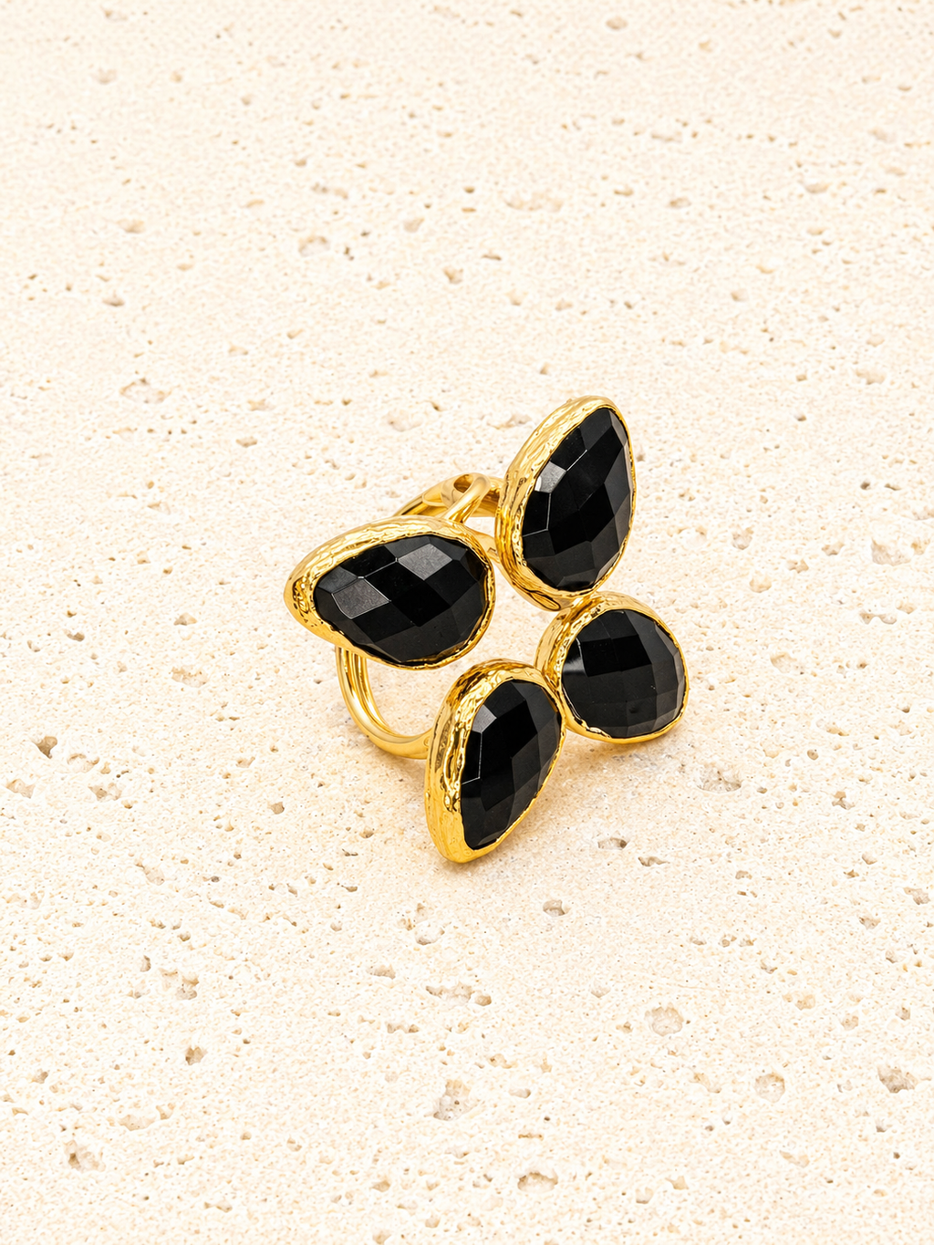 Brass and Onyx four leaf clover