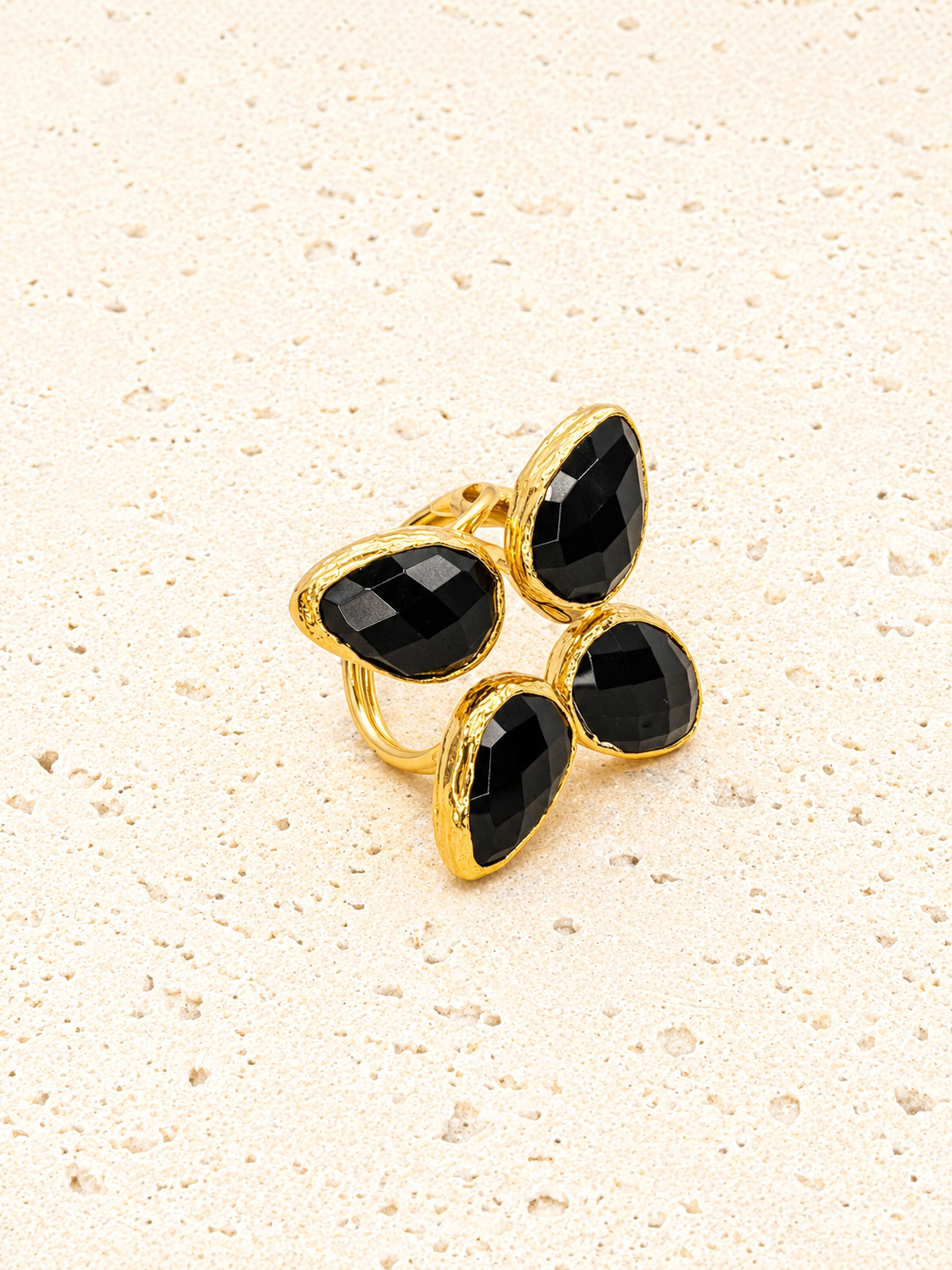 Brass and Onyx four leaf clover