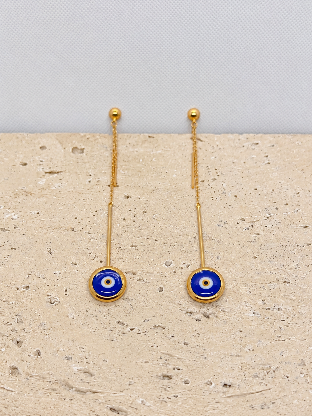 Glass evil eye gold drop earrings
