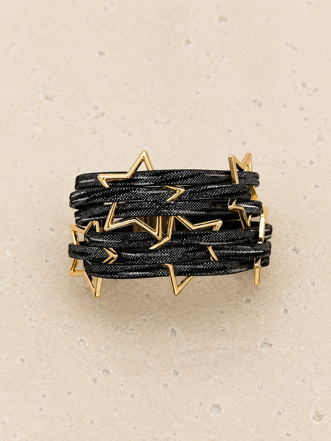 Leather and gold star cuff