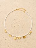Gold disc and beaded necklace