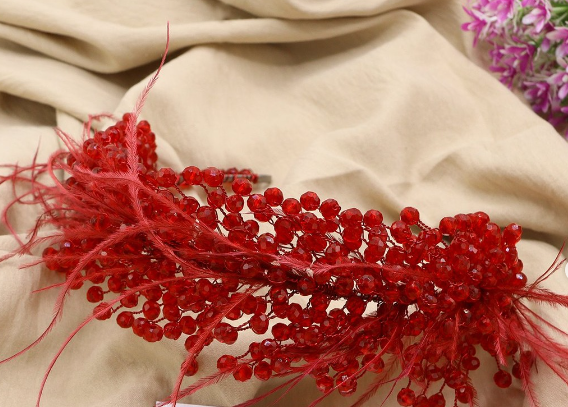 Artisan hair accessory: Headband detailed with feathers and beads - ruby red