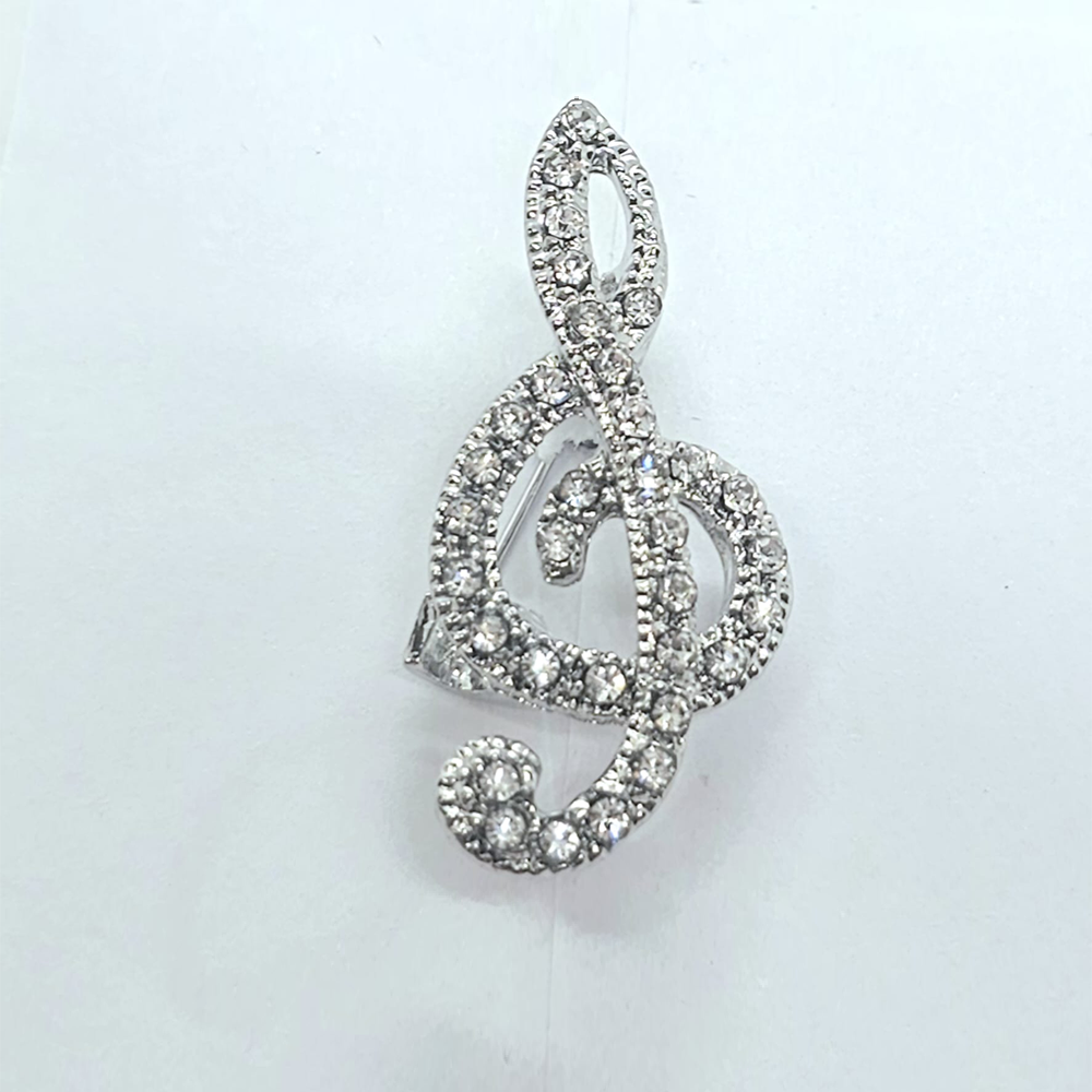 The Clef Brooch